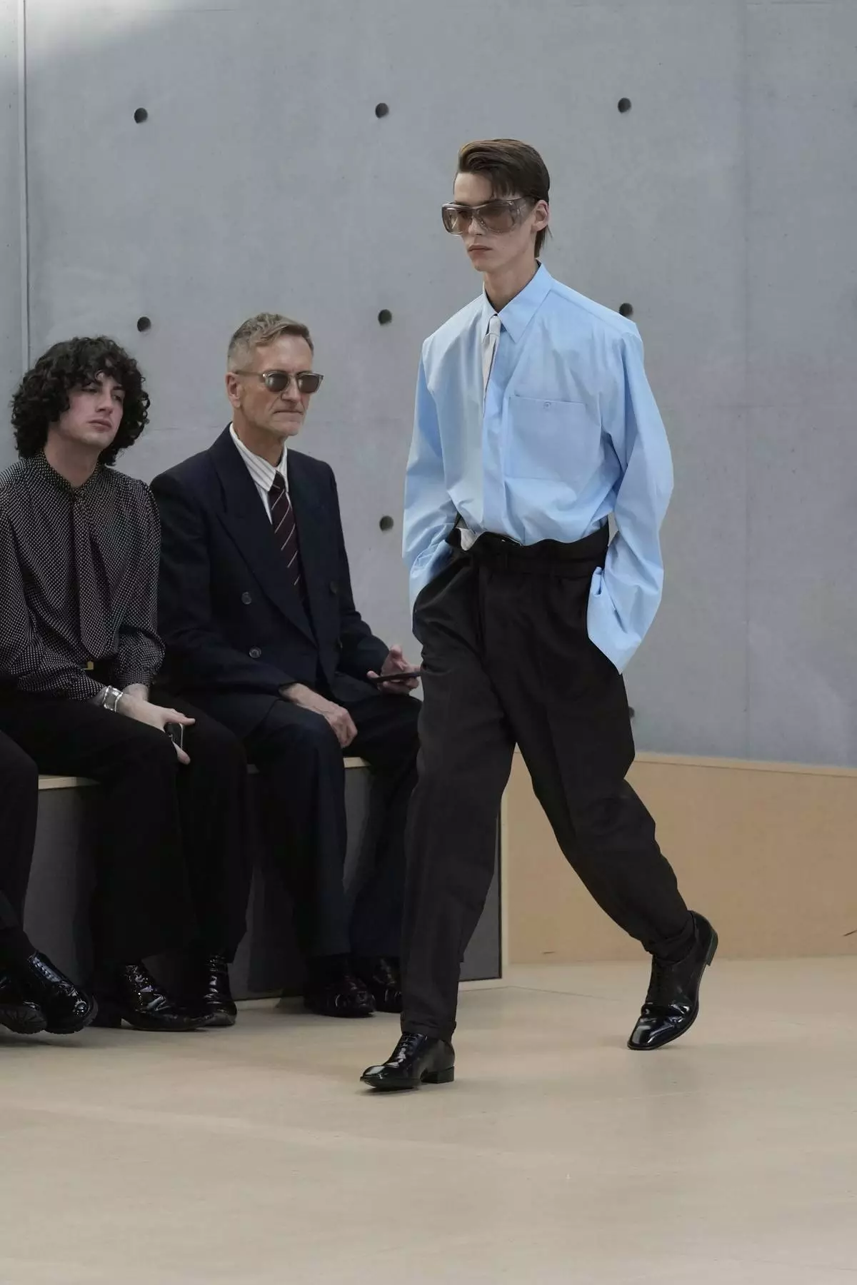 A model wears a creation as part of the men's Saint Laurent Spring-Summer 2026 collection, that was presented in Paris, Tuesday, June 24, 2025. (AP Photo/Michel Euler)
