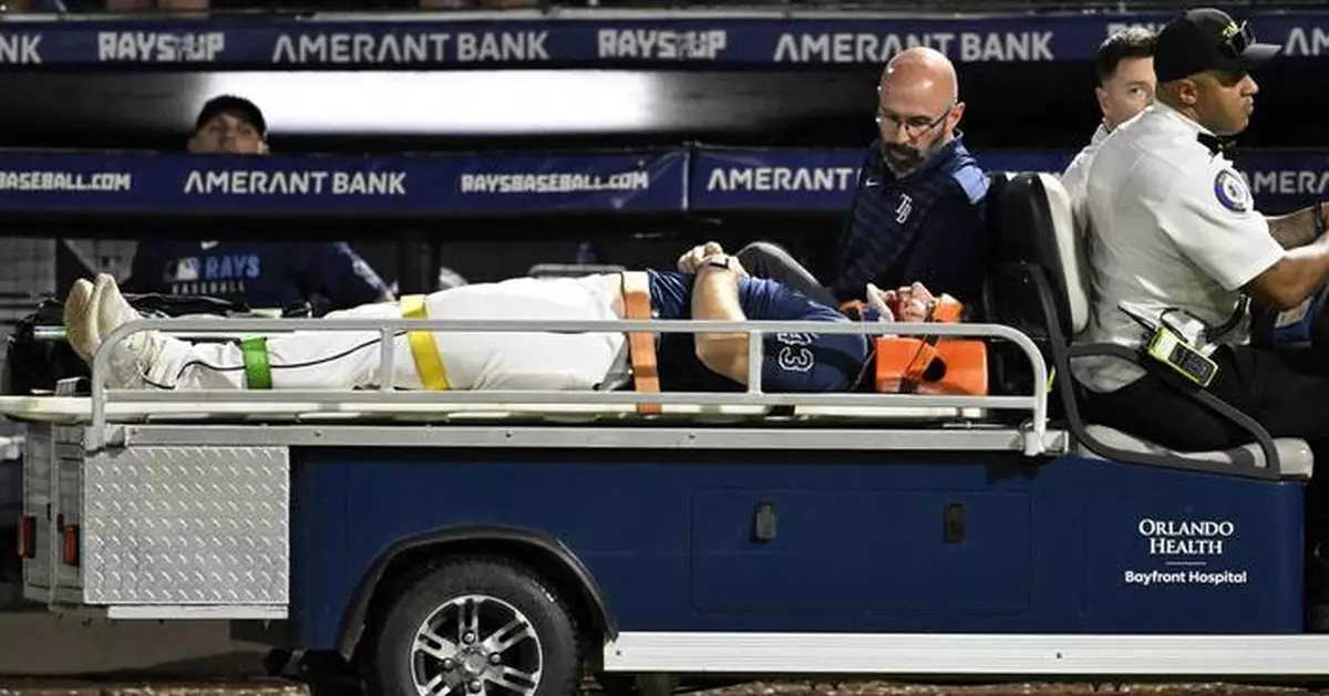 Rays pitcher carted off field and taken to hospital after foul ball into dugout hits him in face