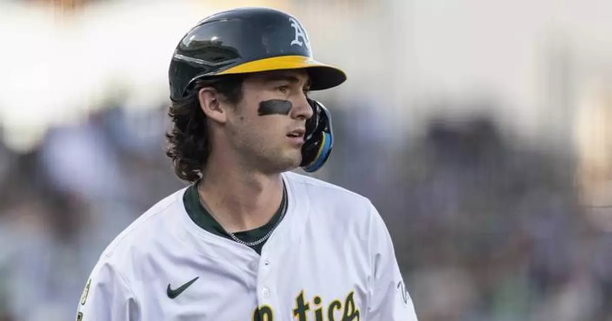 Yanks' Ian Hamilton, frustrated with himself, stares down A's rookie Jacob Wilson