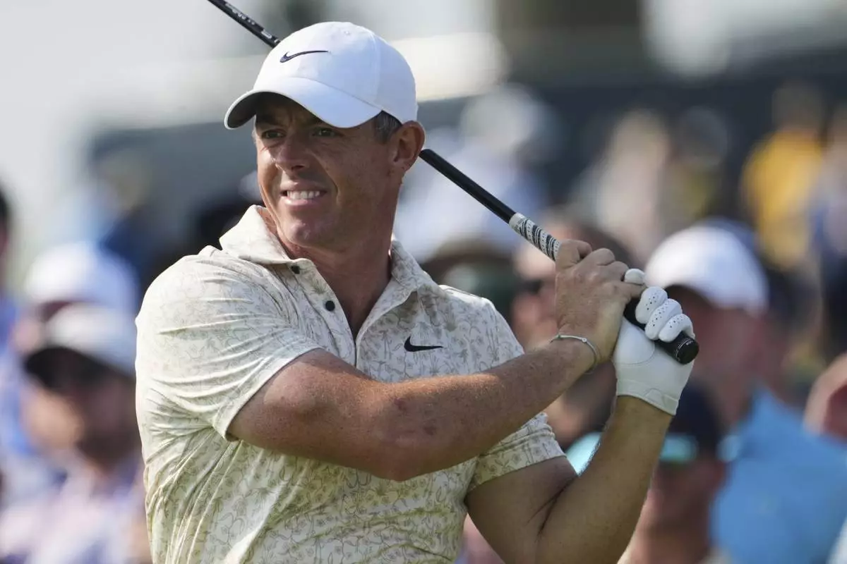 Rory McIlroy, of Northern Ireland, tees off on the 15th hole during the first round of the U.S. Open golf tournament at Oakmont Country Club Thursday, June 12, 2025, in Oakmont, Pa. (AP Photo/Gene J. Puskar)