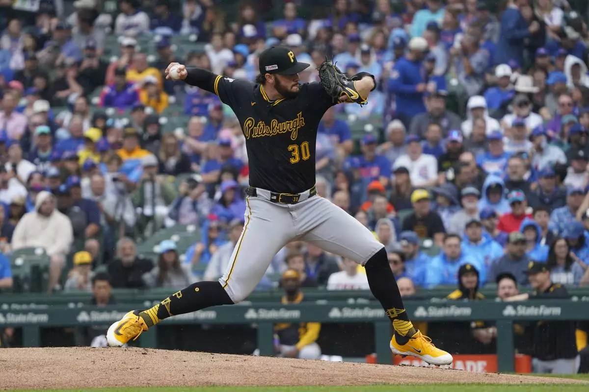 Pittsburgh Pirates pitcher Paul Skenes (30) throws during the first inning of a baseball game against the Chicago Cubs, Friday, June 13, 2025, in Chicago. (AP Photo/David Banks)