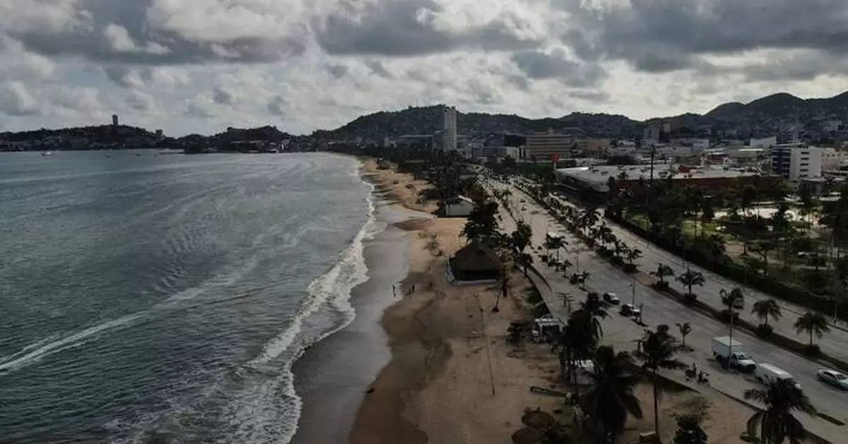 Erick turns rainmaker after hitting Mexico's Pacific coast as a strong hurricane. 1 dead