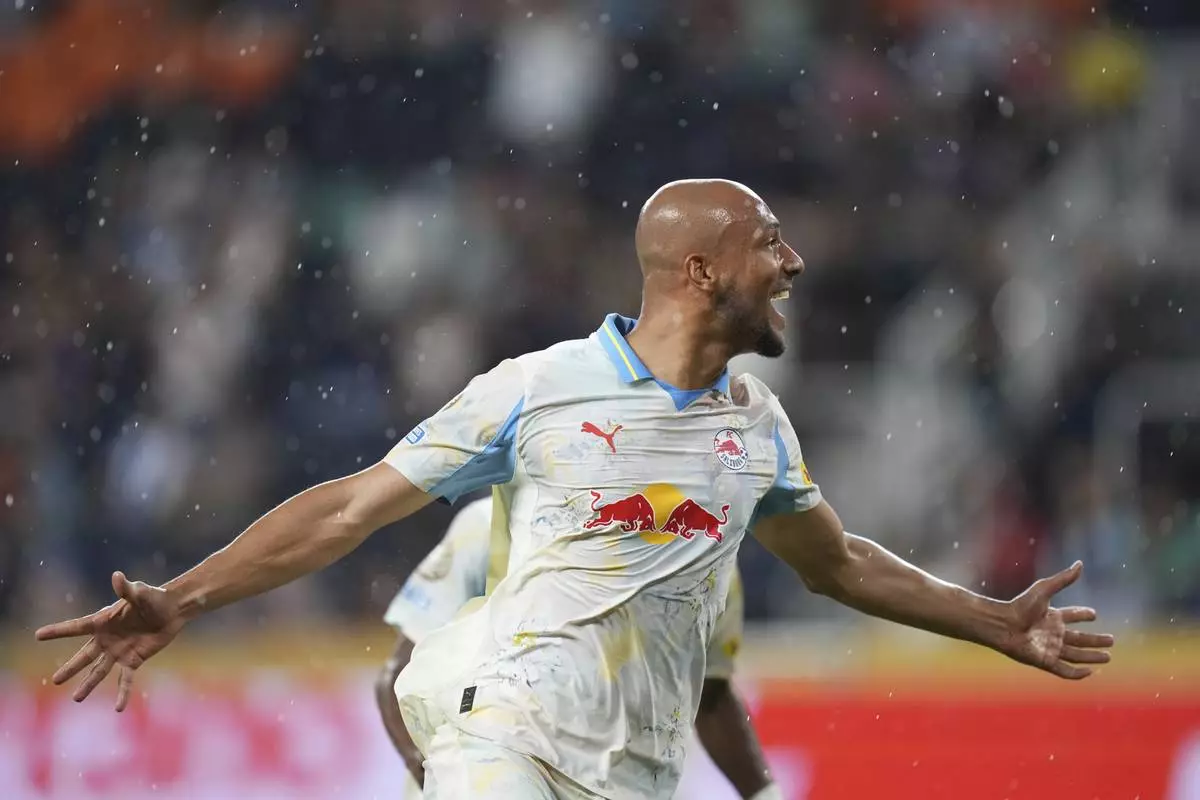 Red Bull Salzburg's Karim Onisiwo reacts after scoring a goal during the Club World Cup group H soccer match between CF Pachuca and FC Salzburg in Cincinnati, Wednesday, June 18, 2025. (AP Photo/Joshua A. Bickel)