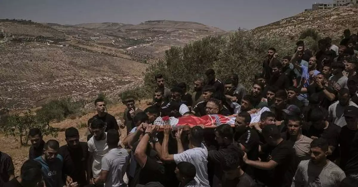 Israeli settlers rampage at a military base in the West Bank