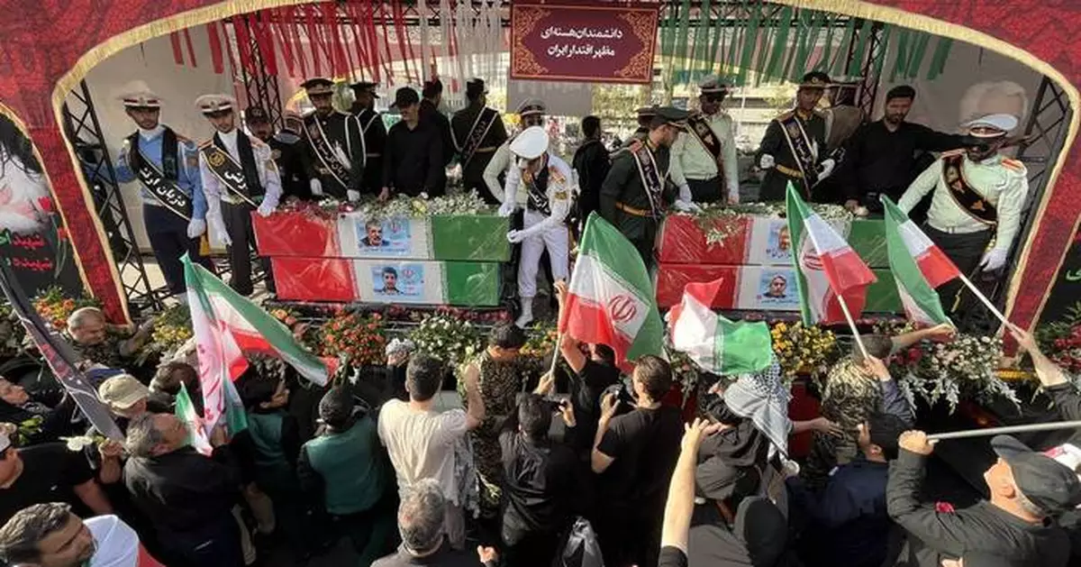 Hundreds of thousands mourn top Iranian military commanders and scientists killed in Israeli strikes