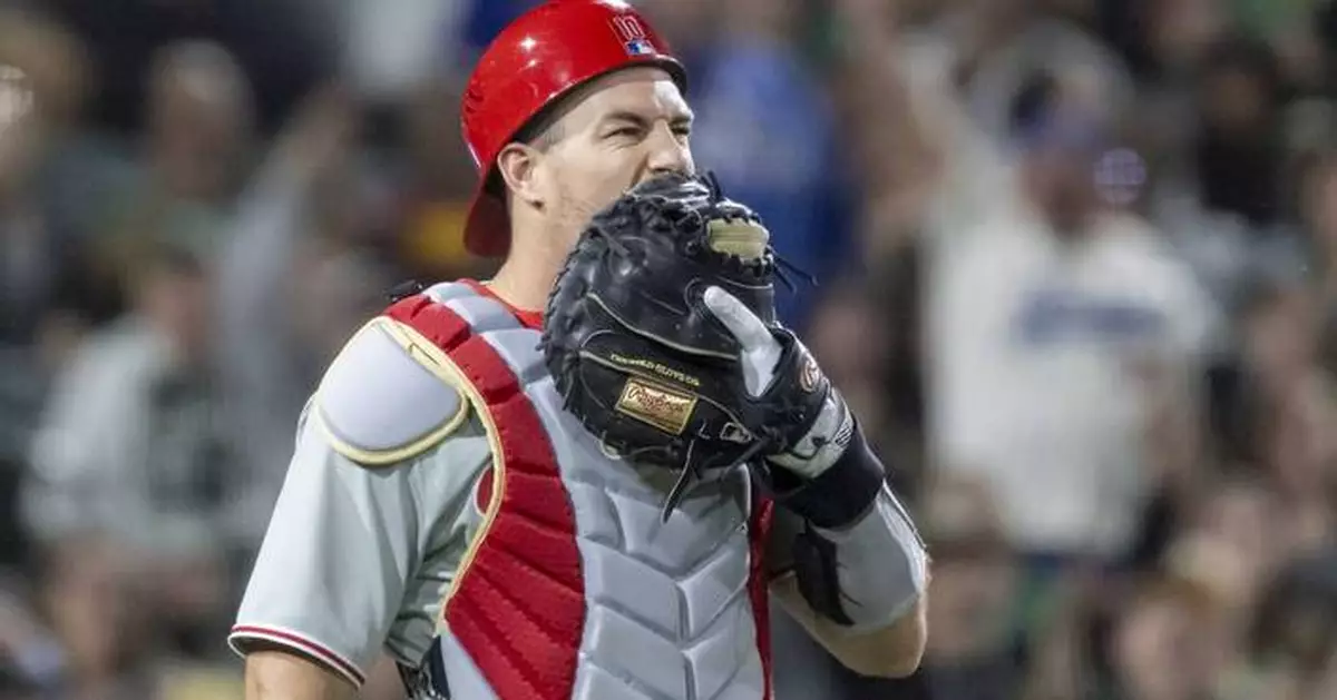 Phillies catcher J.T. Realmuto leaves game after being hit in area of protective cup by foul tip
