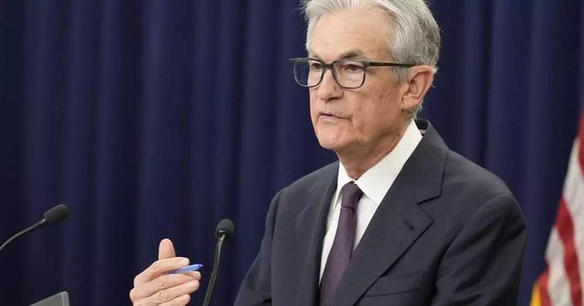 Fed leaves key rate unchanged as it awaits the impact of tariffs and Trump again scolds Powell