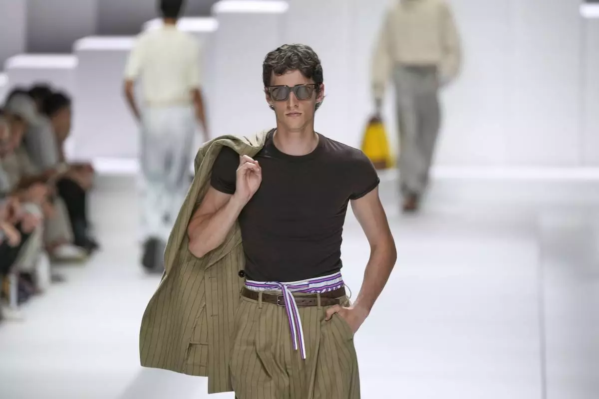 A model wears a creation as part of the men's Dolce &amp; Gabbana Spring-Summer 2026 collection, that was presented in Milan, Italy, Saturday, June 21, 2025. (AP Photo/Luca Bruno)