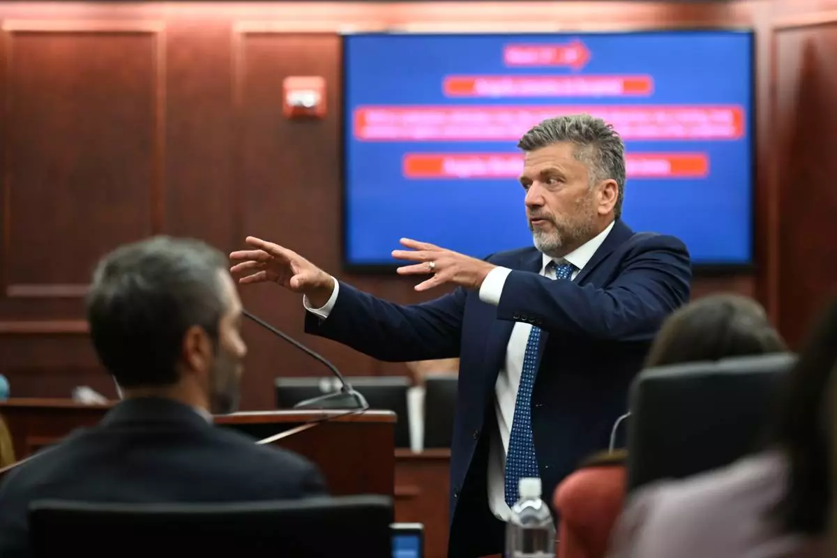 Ryan Brackley, a lawyer for the prosecution, delivers his opening arguments during the murder trial for James Craig, accused of killing his wife, at the Arapahoe District Court, Tuesday, July 15, 2025, in Centennial, Colo. (Stephen Swofford via Denver Gazette, Pool)