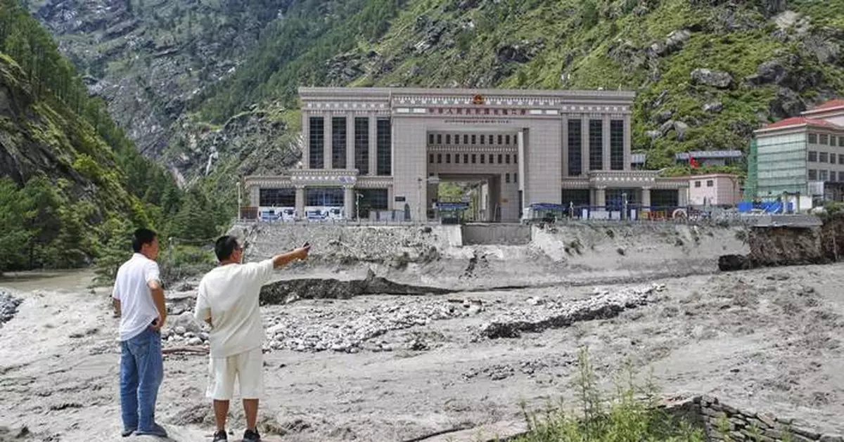 Rescuers search for 19 missing and recover 9 bodies after flooding in Nepal