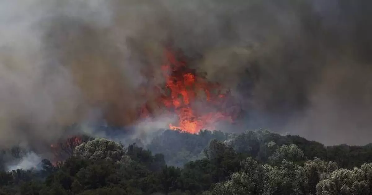 Wildfire in Greece prompts evacuation while firefighters tackle blazes in Turkey and Syria