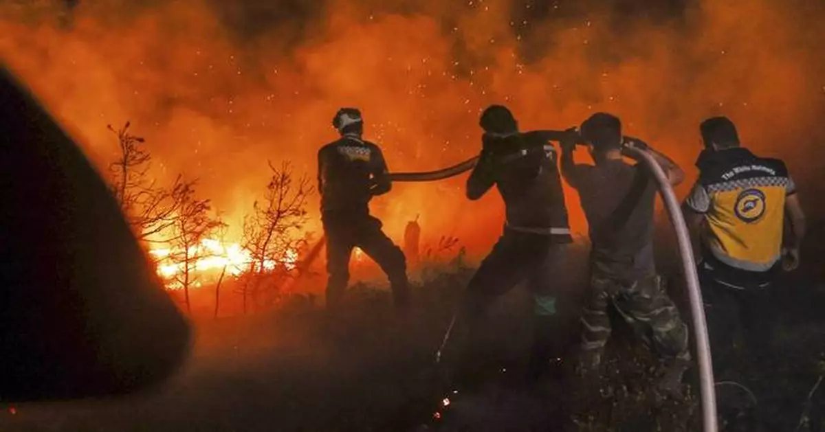 Syrian wildfires spread due to heavy winds and war remnants