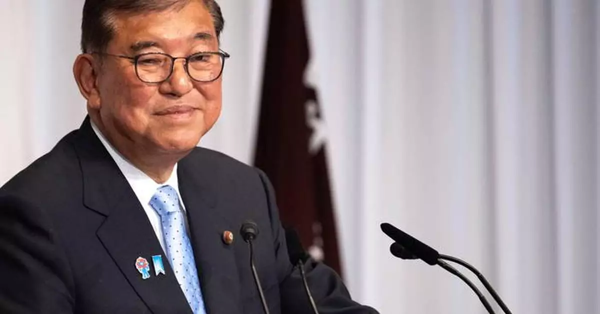 Japan's Ishiba says he'll stay in office to tackle inflation and US tariffs despite election loss
