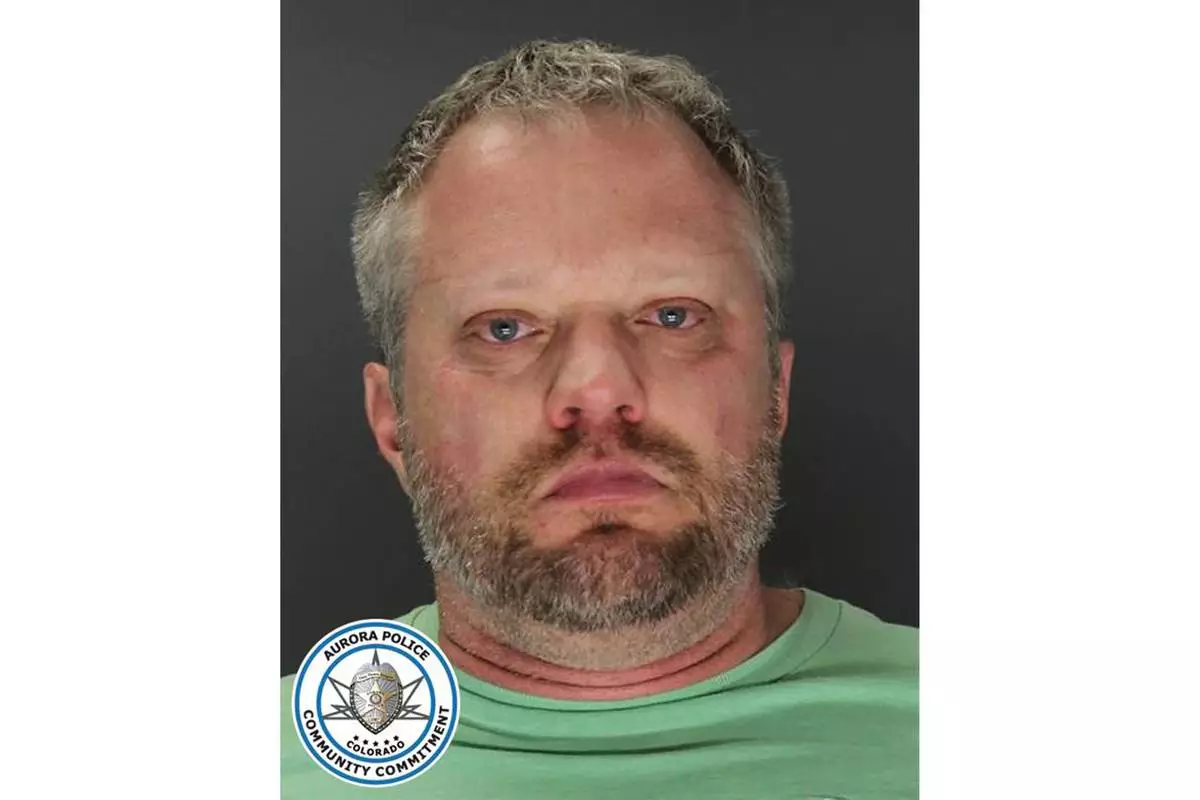 FILE - This undated booking photo provided by the Aurora, Colo., Police Department shows James Craig. (Aurora Police Department via AP, File)