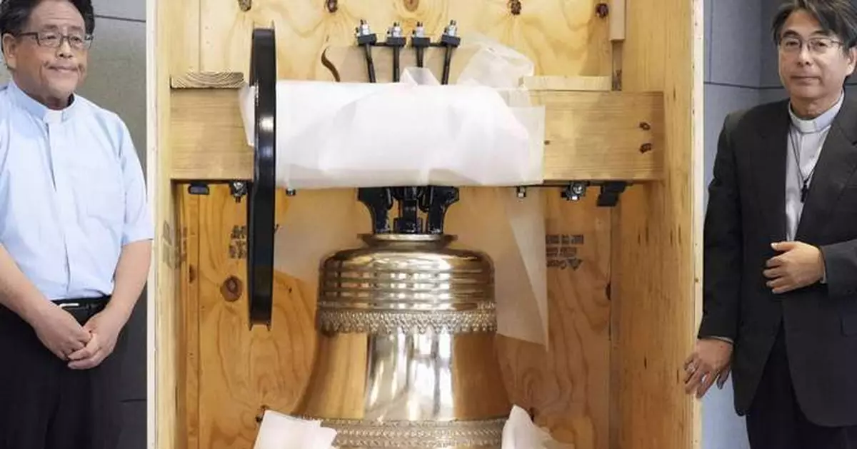 Nagasaki cathedral blesses a bell that replaces one destroyed by the US atomic bomb