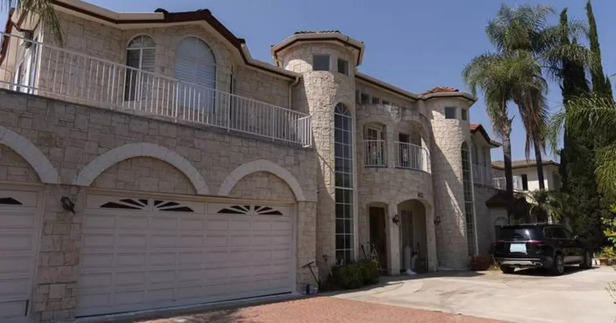 Questions about surrogacy are raised in case of California couple with house brimming with kids