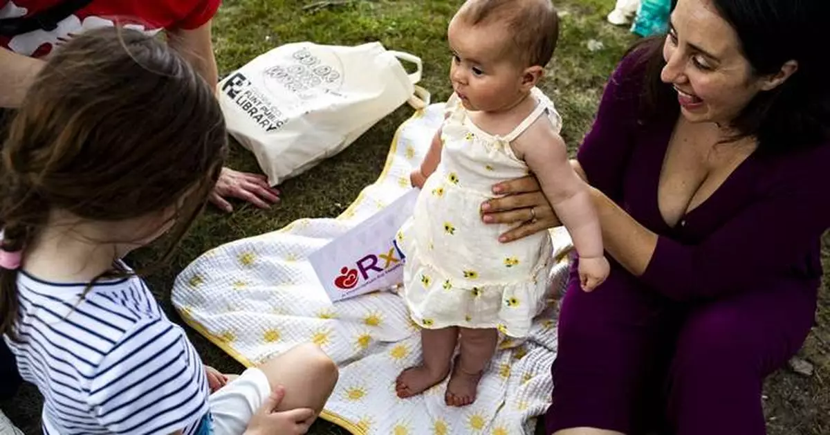 How a Michigan program that gives new mothers cash could be a model for rest of US