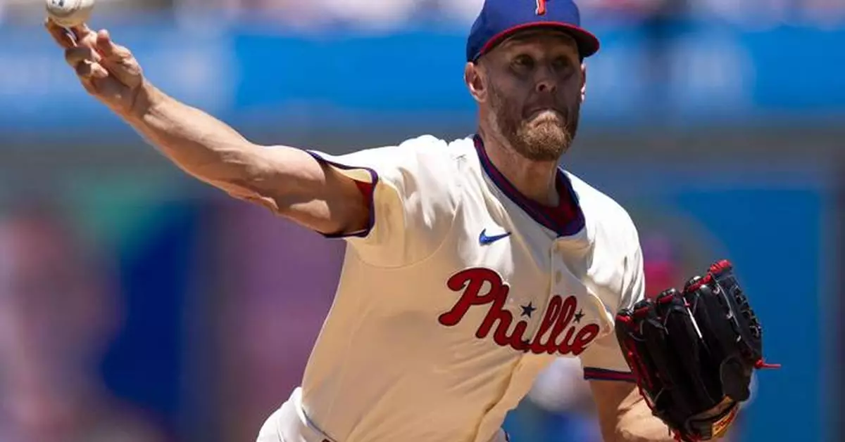Zack Wheeler throws 1-hitter for first complete game since 2021, leading Phillies past Reds
