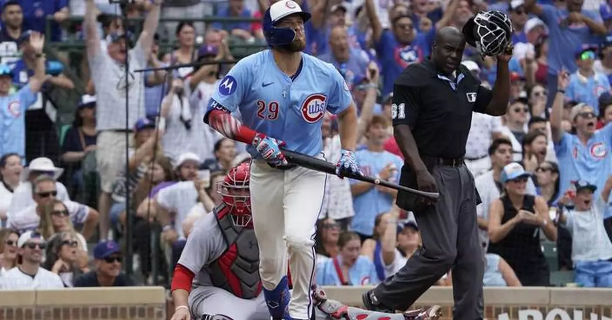 Busch hits 3 homers and Cubs set club record with 8 in 11-3 rout of Cardinals