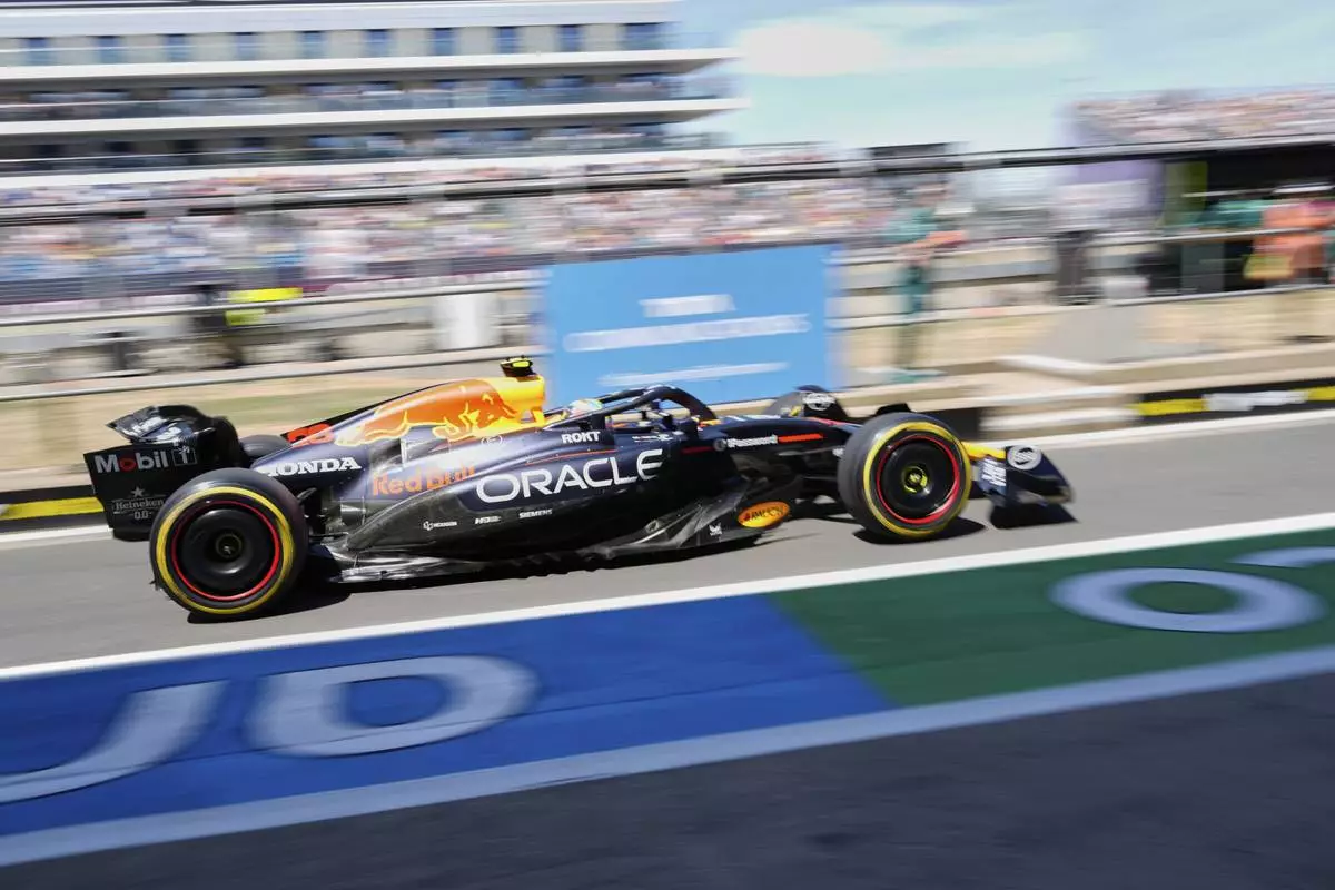 Red Bull driver Arvid Lindblad of Sweden exits the pit lane during the first practice of the British Formula One Grand Prix in Silverstone, England, Friday, July 4, 2025. (AP Photo/Darko Bandic)