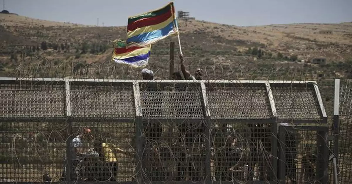 The Latest: 20 killed at Gaza food hub; Israel continues strikes in Syria