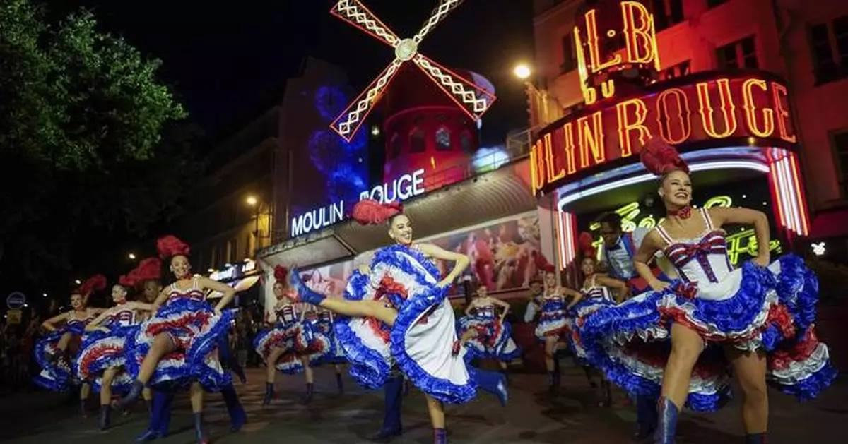 Moulin Rouge's red windmill sails restored and turning again