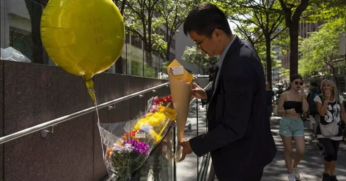 Victims of New York City shooting include a police officer and an executive at investment firm
