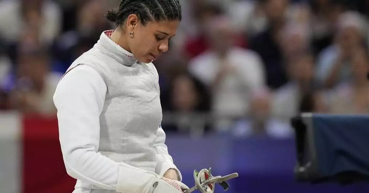 Kissing contamination defense clears French Olympic fencer Thibus in doping appeal case