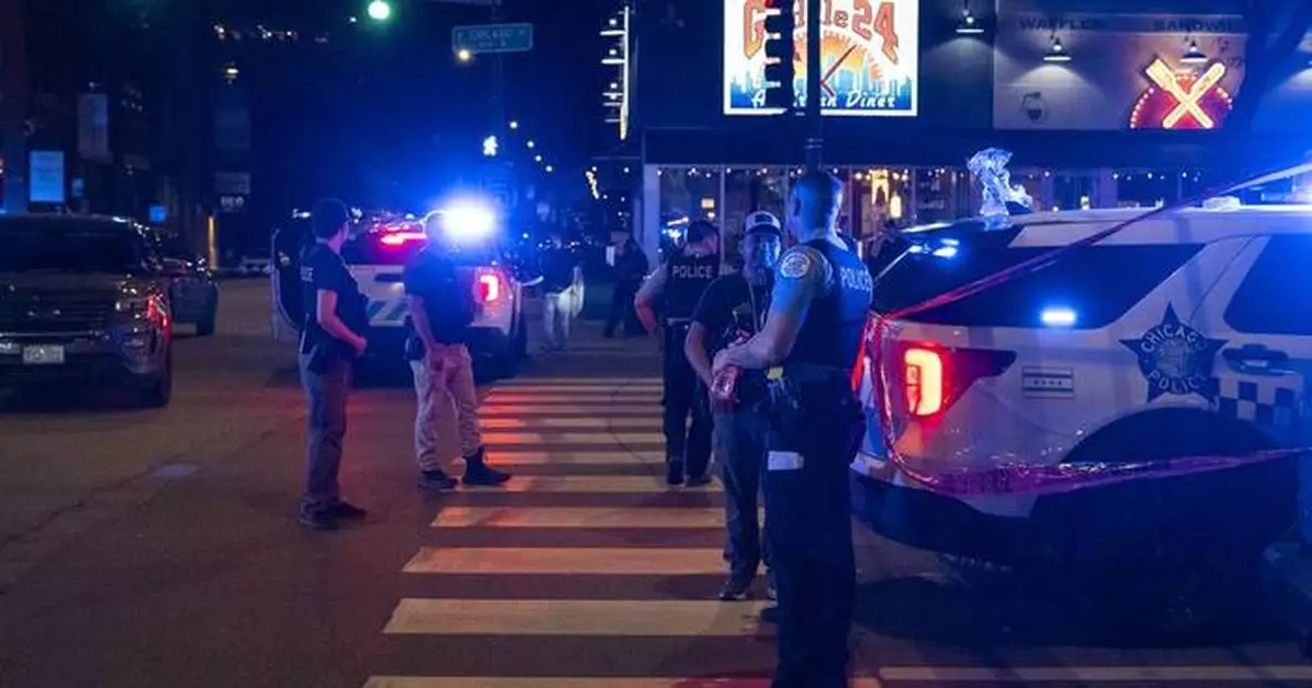 Drive-by shooting kills 4 and wounds 14 others after a party at a Chicago restaurant