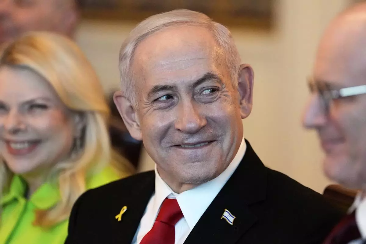 Israel's Prime Minister Benjamin Netanyahu attends a meeting with President Donald Trump in the Blue Room of the White House, Monday, July 7, 2025, in Washington. (AP Photo/Alex Brandon)