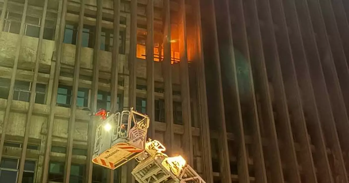 A fire at a telecom company in Cairo injures 14 and temporarily disrupts service