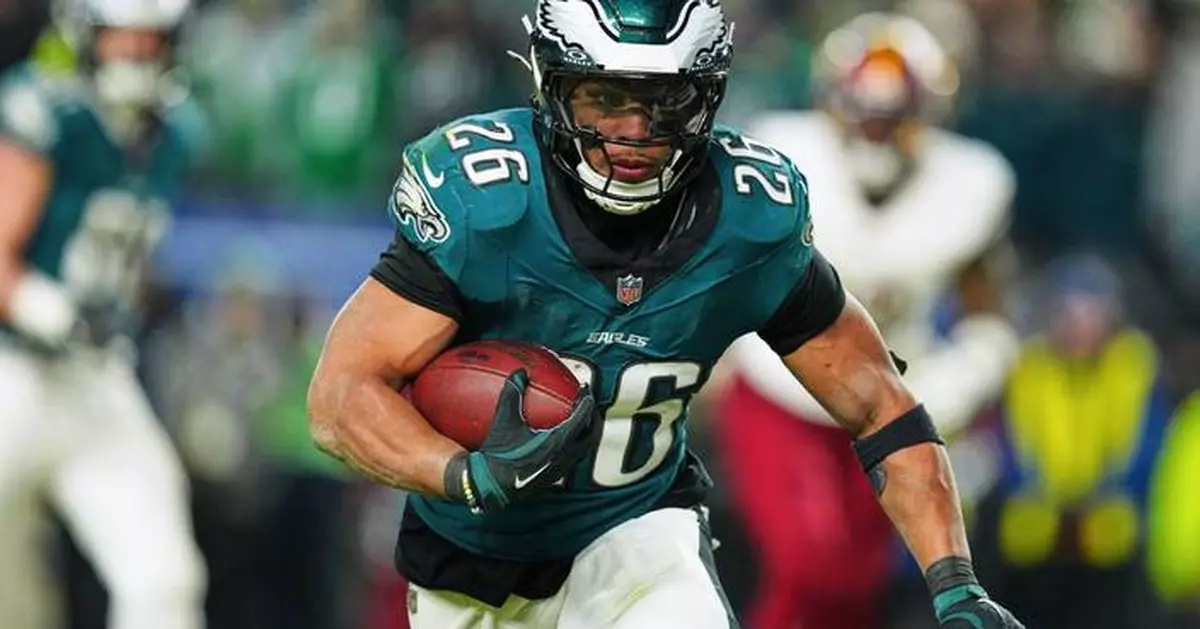 Saquon Barkley is selected as top running back by the AP after a record-setting season