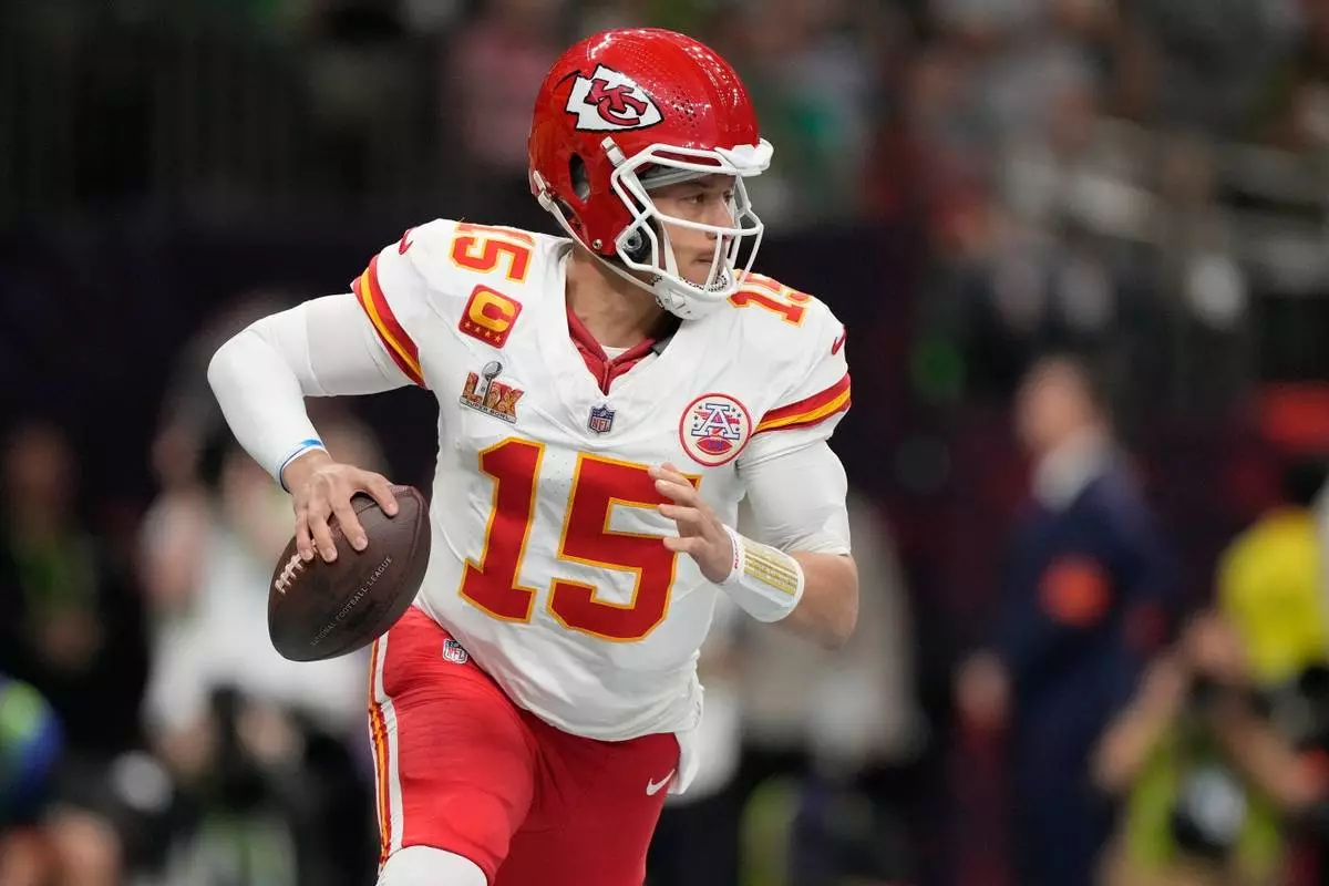 FILE - Kansas City Chiefs quarterback Patrick Mahomes looks to throw against the Philadelphia Eagles during the first half of the NFL Super Bowl 59 football game, Sunday, Feb. 9, 2025, in New Orleans. (AP Photo/Brynn Anderson, File)