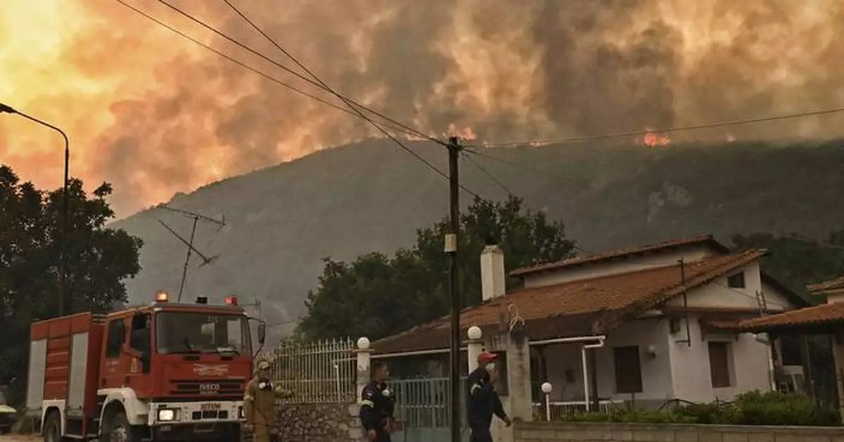A major forest fire in Greece forces several villages to evacuate