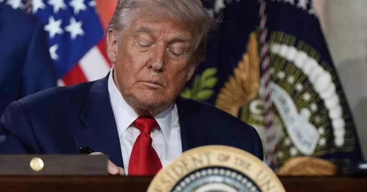 The Latest: Interest rates are central to Trump’s continuing feud with Fed chair Powell