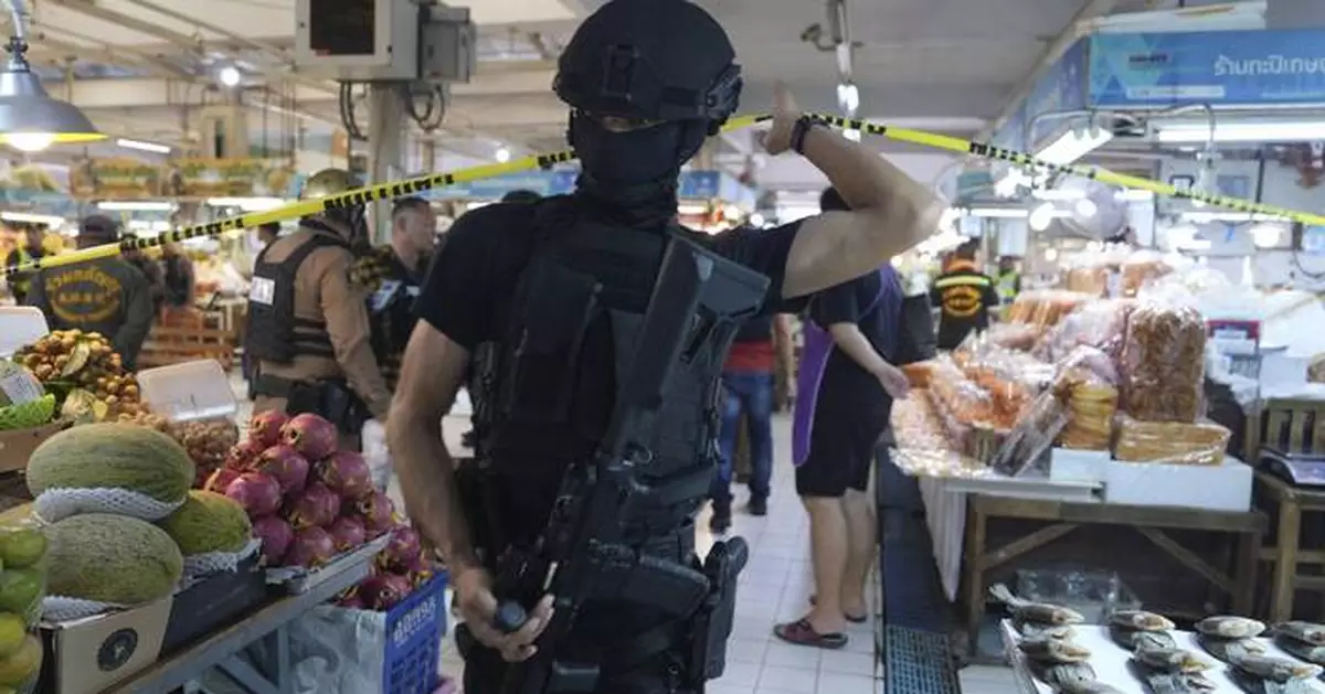 Gunman with a grudge kills 5 and wounds 2 at a Bangkok market before killing himself, police say