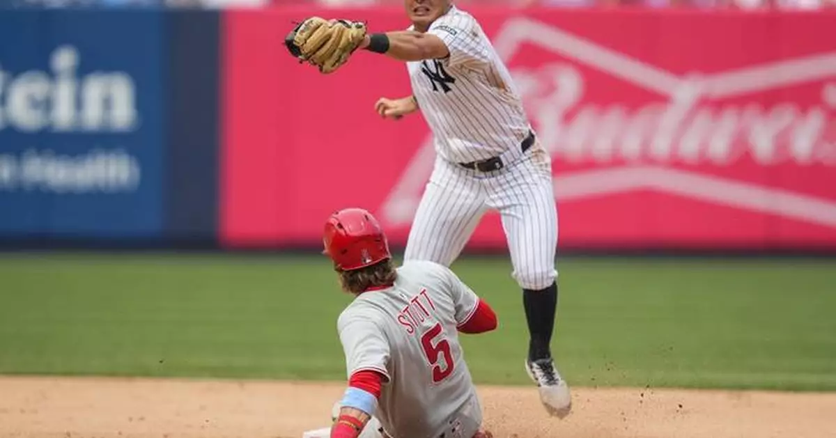 Harper and Schwarber spark the Phillies to a win over the reeling Yankees