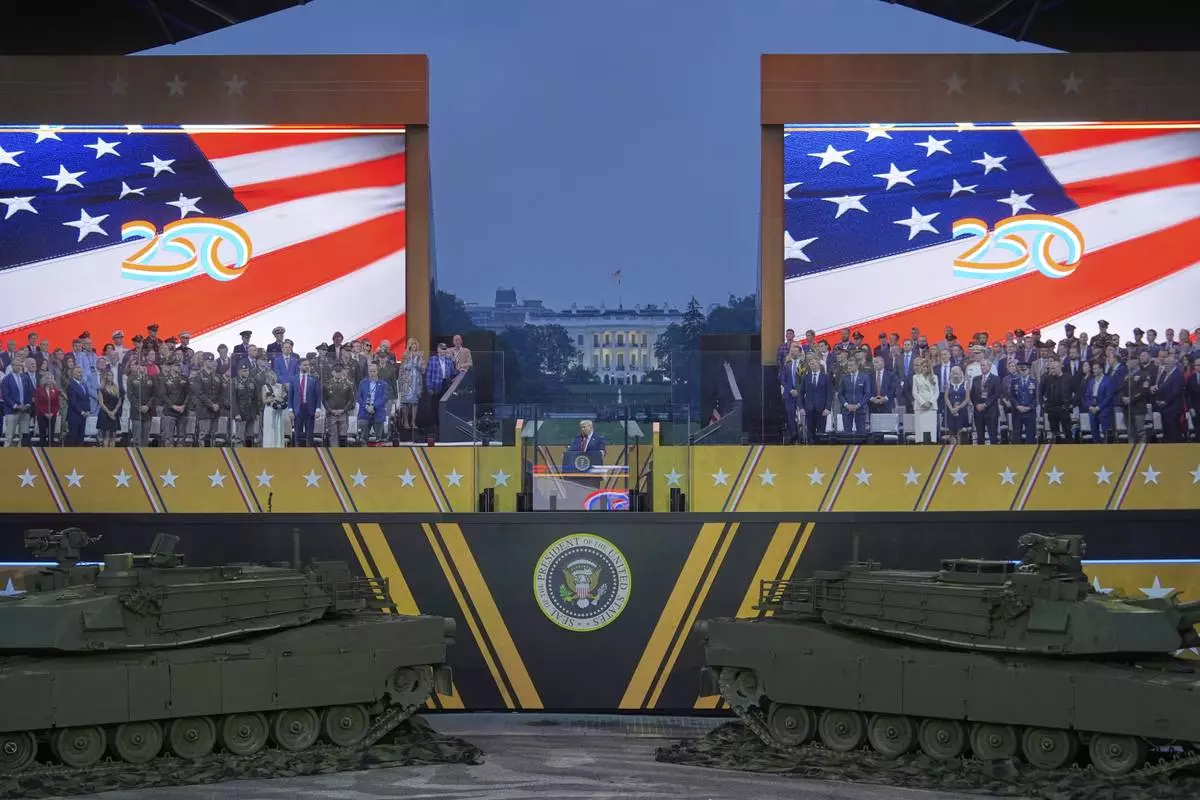 President Donald Trump speaks during a military parade commemorating the Army's 250th anniversary, Saturday, June 14, 2025, in Washington. (AP Photo/Julia Demaree Nikhinson)
