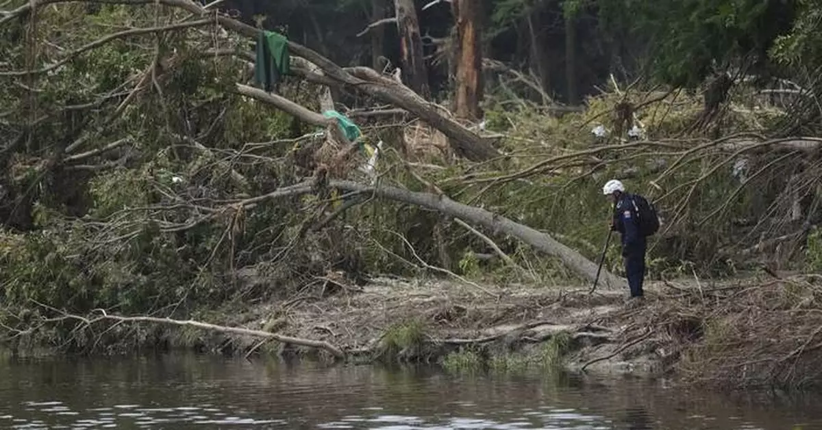 Heavy rains in Texas pause search efforts for flood victims and damage homes elsewhere