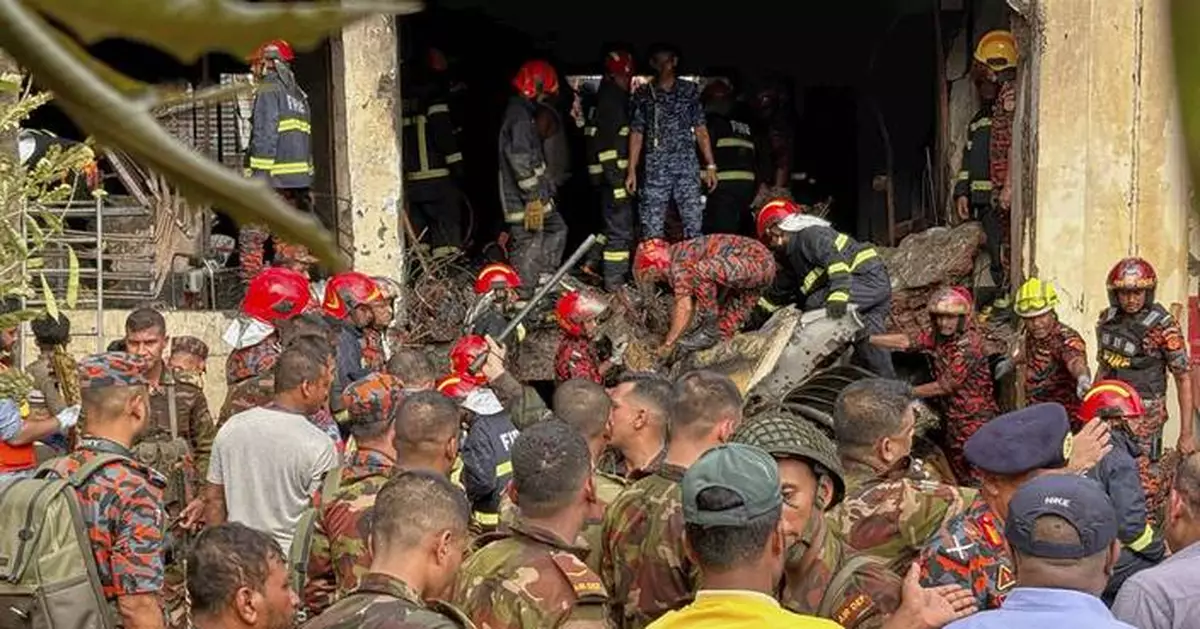 A Bangladesh air force jet crashes into a school in Dhaka, killing at least 27 people