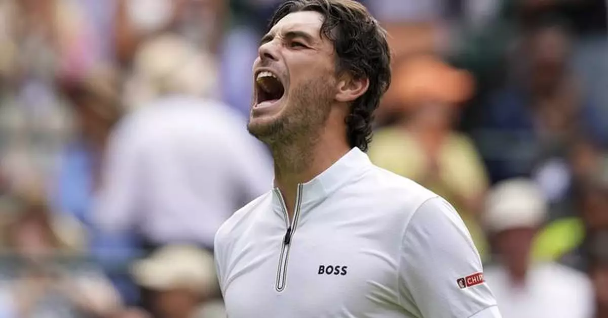 Taylor Fritz wins resumed Wimbledon match in which Mpetshi Perricard hit a record 153 mph serve
