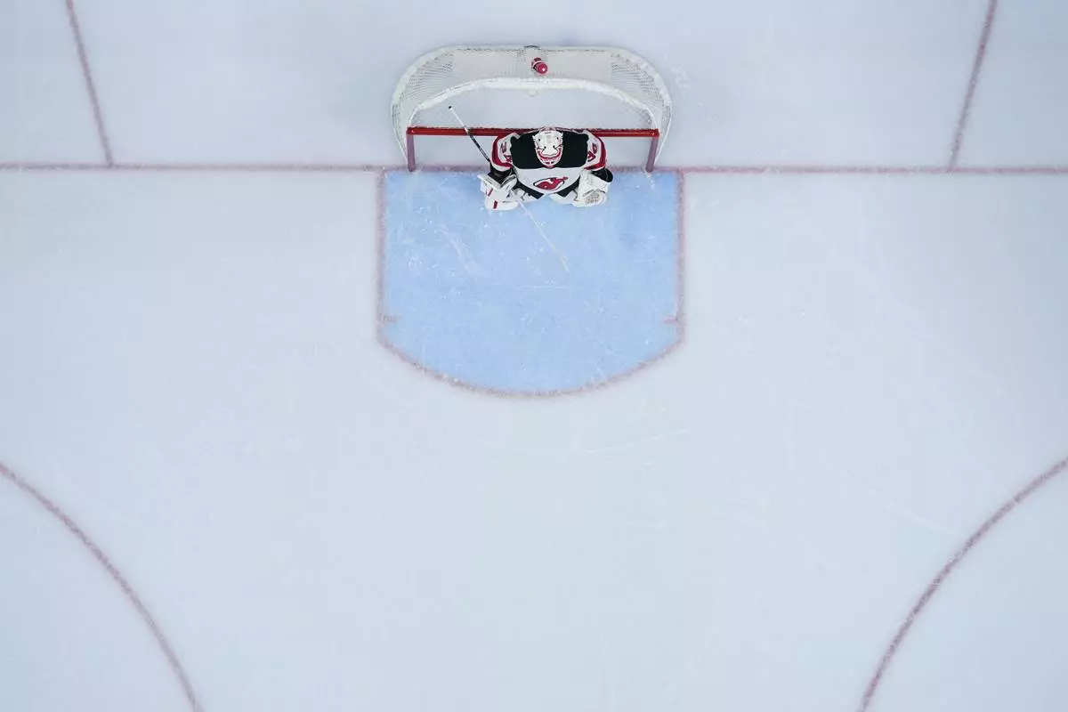 FILE - New Jersey Devils' Jake Allen plays during an NHL hockey game, Jan. 27, 2025, in Philadelphia. (AP Photo/Matt Slocum, File)