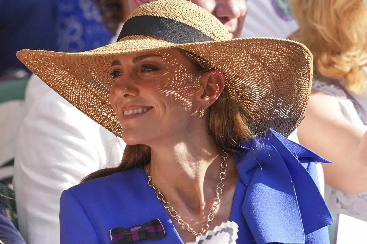 Britain's Kate, Princess of Wales, watches Jannik Sinner of Italy and Carlos Alcaraz of Spain during their men's singles final match at the Wimbledon Tennis Championships in London, Sunday, July 13, 2025.(AP Photo/Kirsty Wigglesworth)