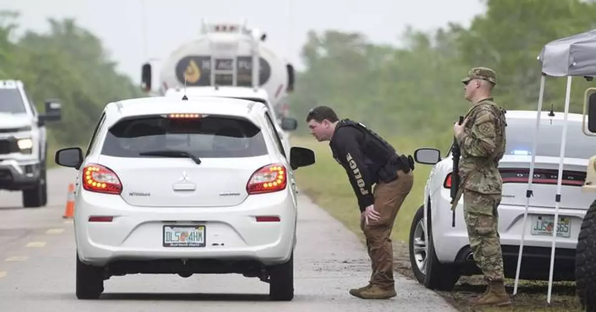 First immigration detainees arrive at Florida center in the Everglades