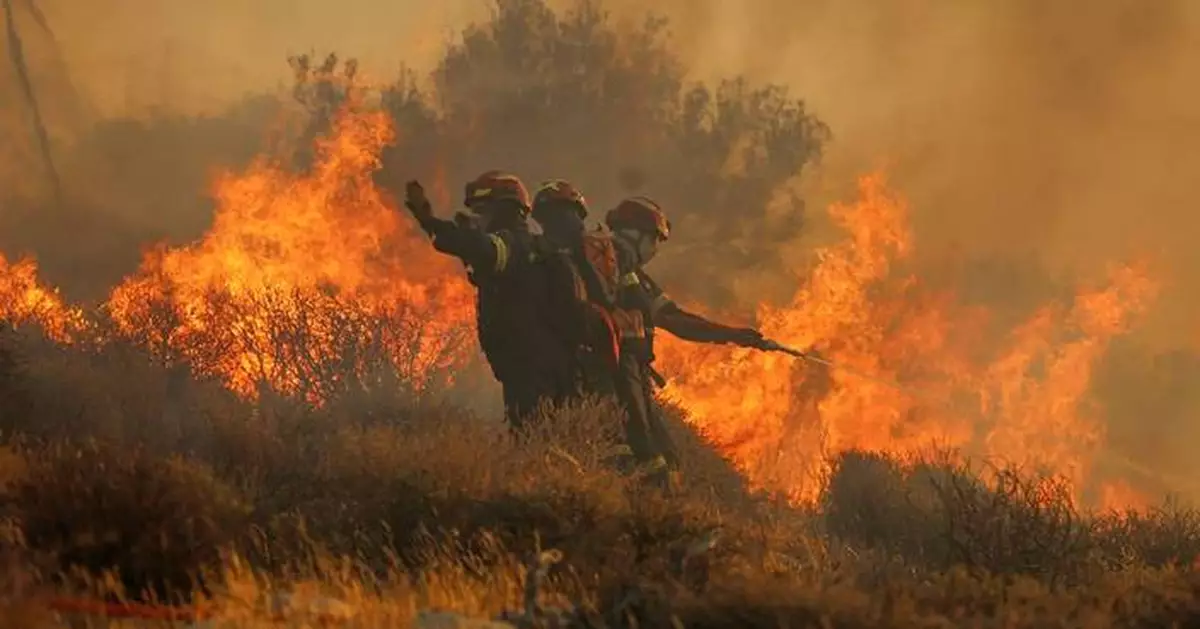 Firefighters race to contain wildfires in Greece as thousands evacuated, 2 die in Turkey