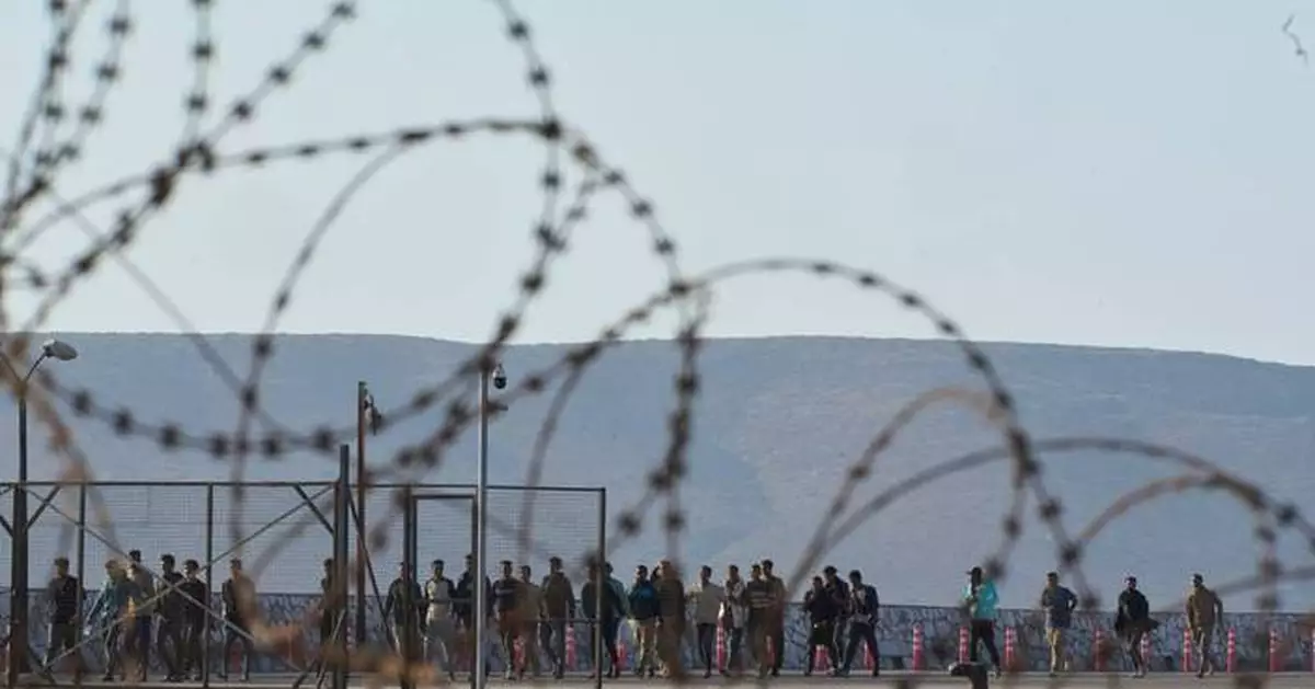 Photos show migrants intercepted near Crete arrive at the Greek port of Lavrio from Libya
