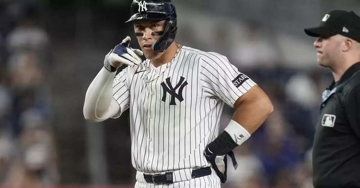 Judge and Raleigh trade homers late in Yankees' 10-3 rout of Mariners