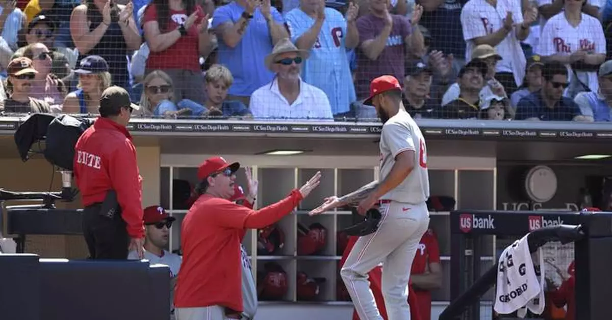 Realmuto doubles in Harper in the 8th as the Phillies beat the Padres 2-1