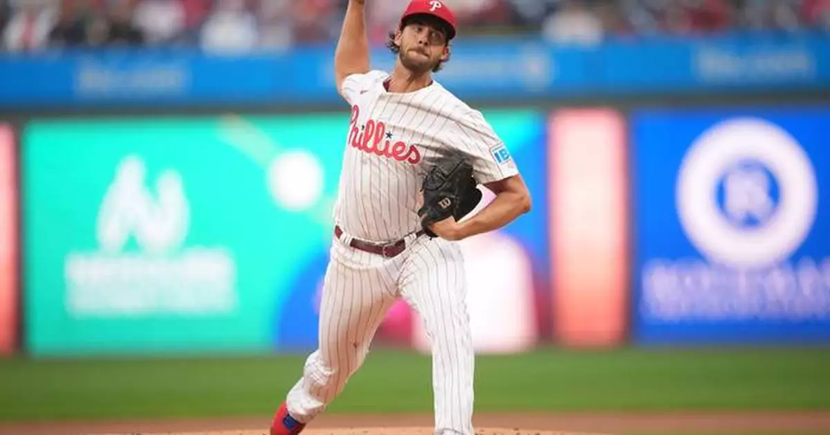 Phillies pitcher Aaron Nola throws to batters, ramping up return from ankle and rib injuries