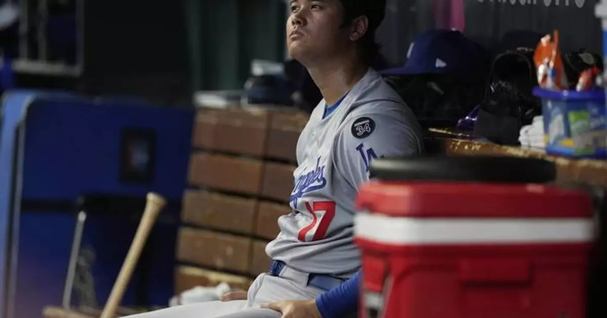 Steer's 2-run triple in 8th helps Reds beat Dodgers 5-2 after Ohtani's outing cut short